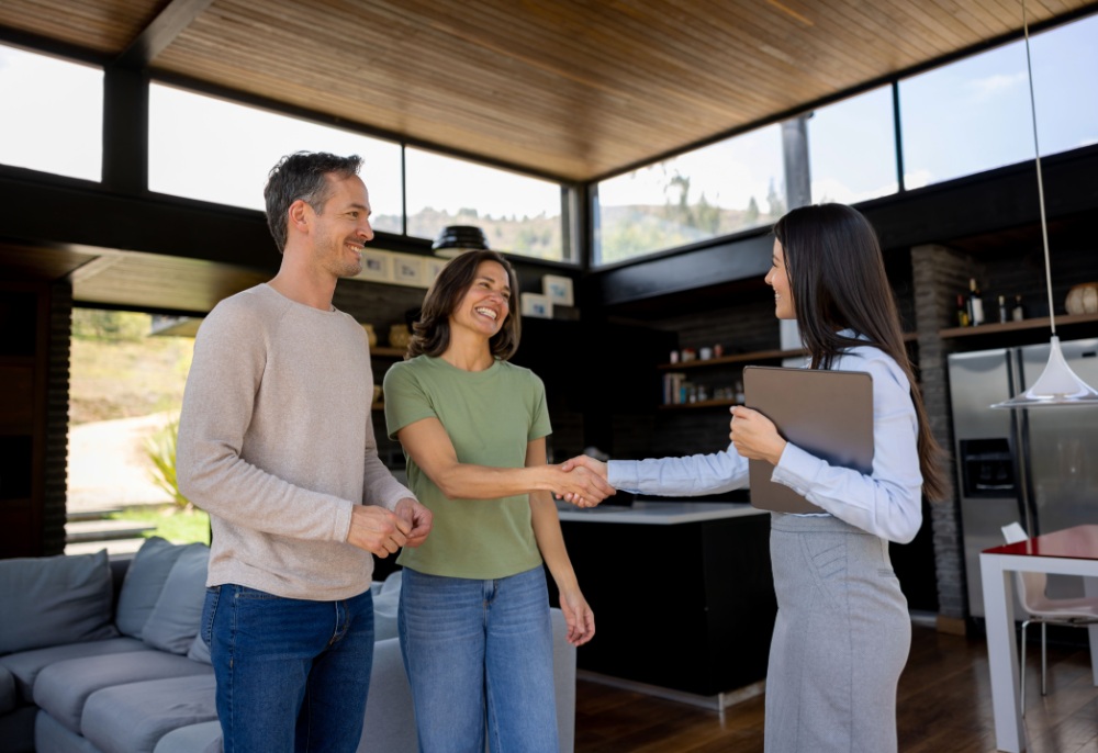Couple making deal with realtor