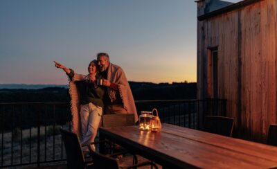 couple pointing on distance