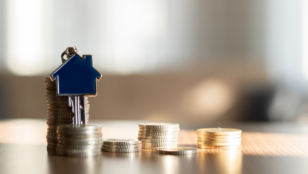 Close-up Coins and house key